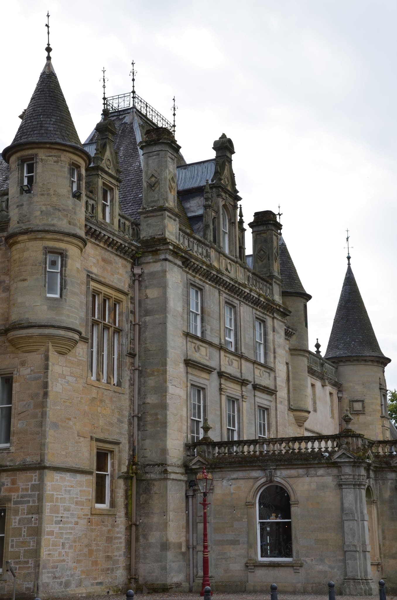 historic Scottish castle with turrets and ornate architecture